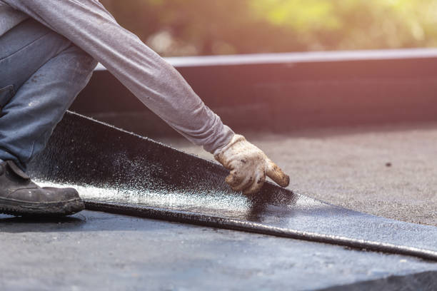Professional Waterproofing technician working in Dennison, OH